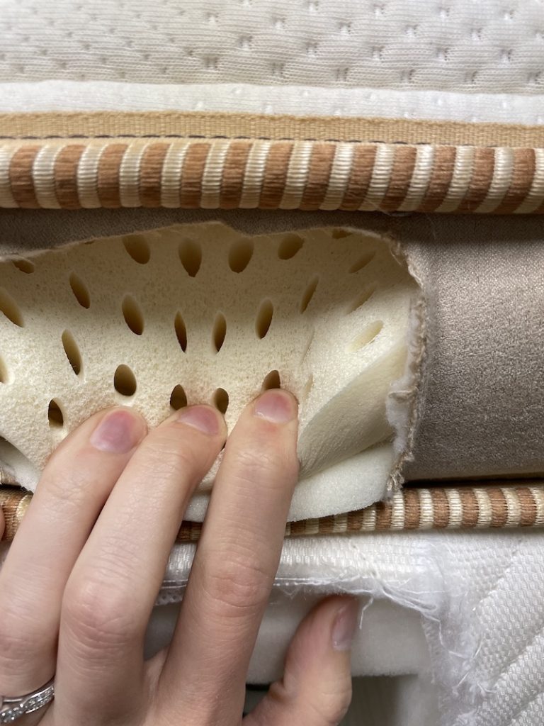 Julia Forbes, testing a latex mattress