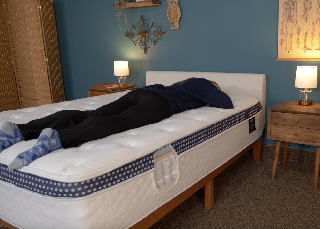 Lead Product Tester Julia testing the Winkbed mattress in various sleeping positions